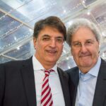 Foto di due colleghi al Christmas Party 2016 di Magazzino Allied International. Sorrisi e atmosfera festosa.