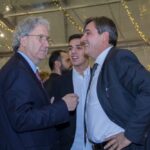IMG_33.jpg: Festa di Natale 2017 Allied International, tre uomini sorridenti in conversazione.