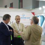 Incontro alla NAPEC 2025, Orano, Algeria: professionisti discutono di forniture e tecnologie.